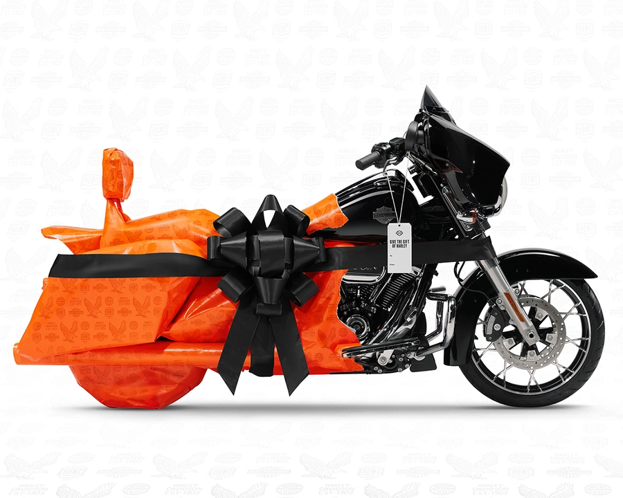 Motorcycle wrapped up with a black bow
