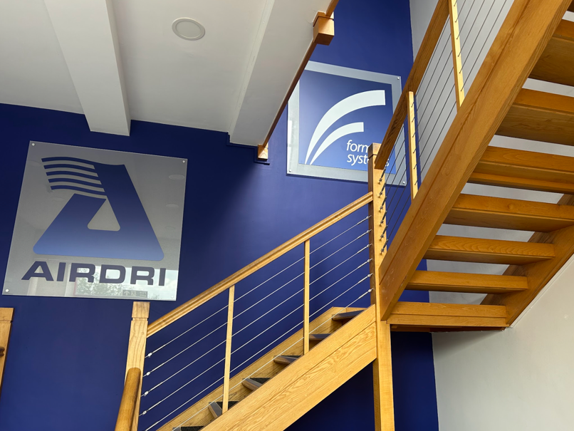 Airdri branding signs by the stairwells