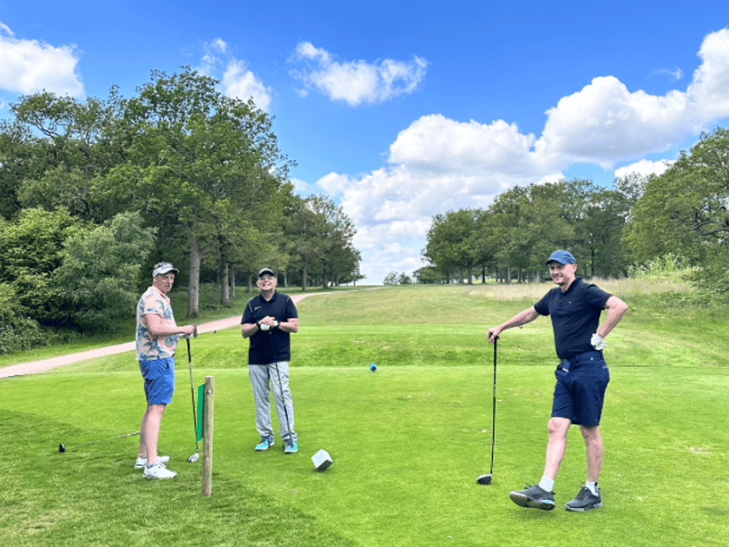 Iain playing golf