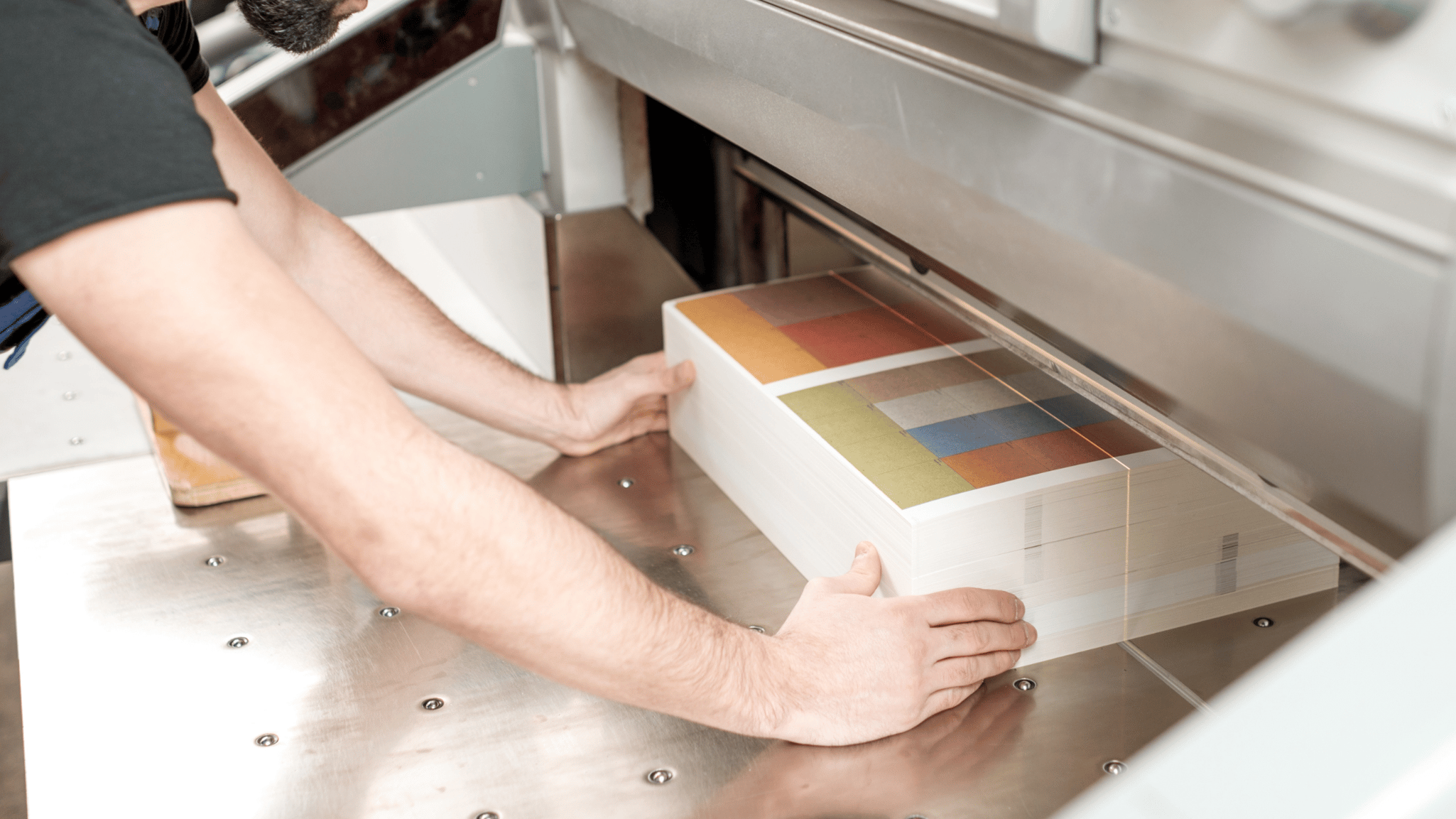 showing print materials coming out of the printer